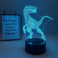 Colourful cartoon dinosaur LED desk lamp with remote control and acrylic lampshade on a black base