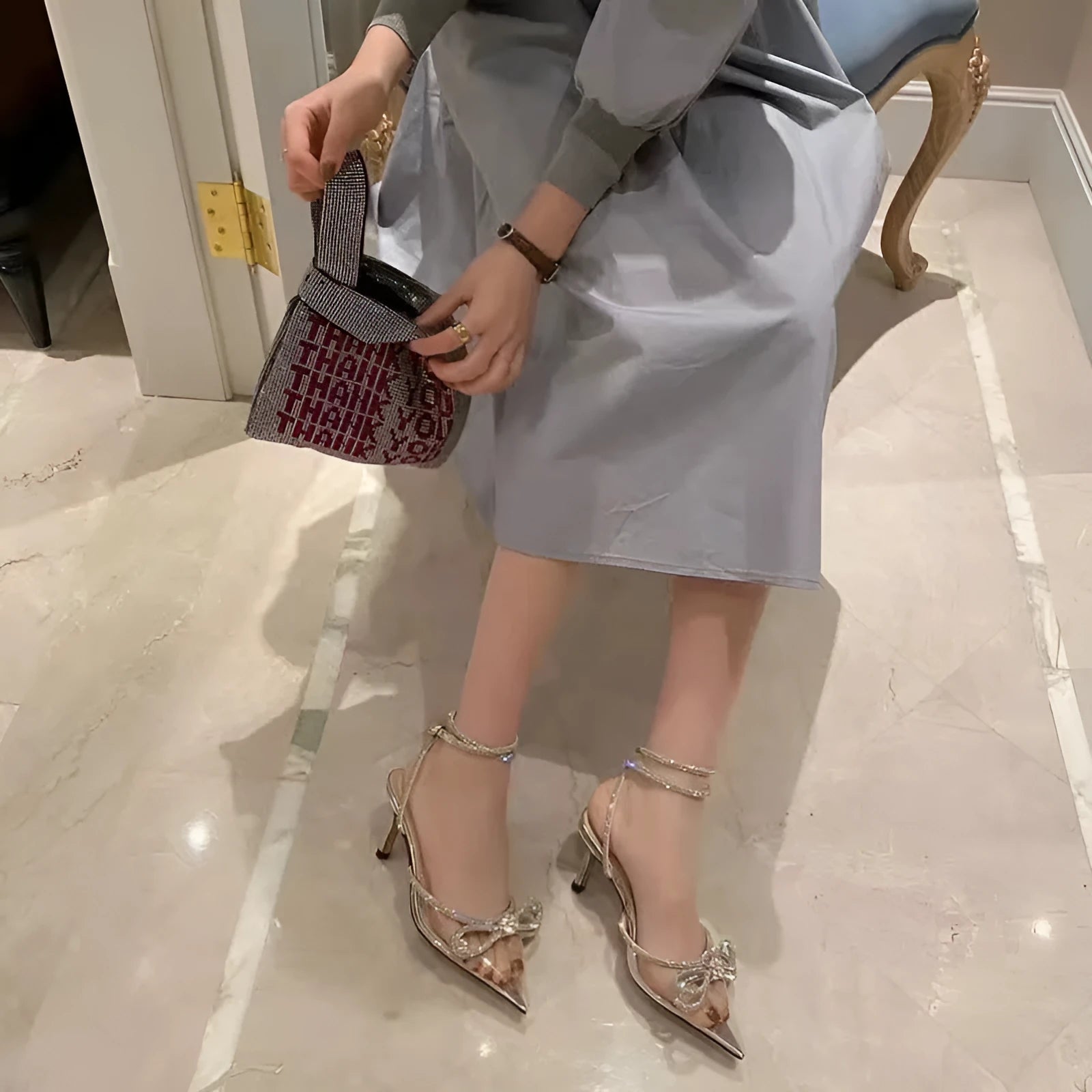 Women's black silk bandage stiletto heel sandals with buckle closure on ankle strap