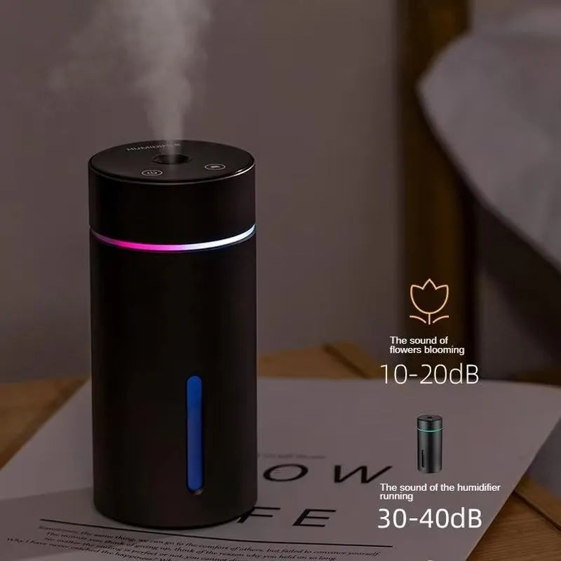 Aluminium portable car humidifier and essential oil diffuser with night light on a black USB cable.