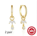 Sterling silver geometric earrings with sunflower design and zircon inlay in golden colour