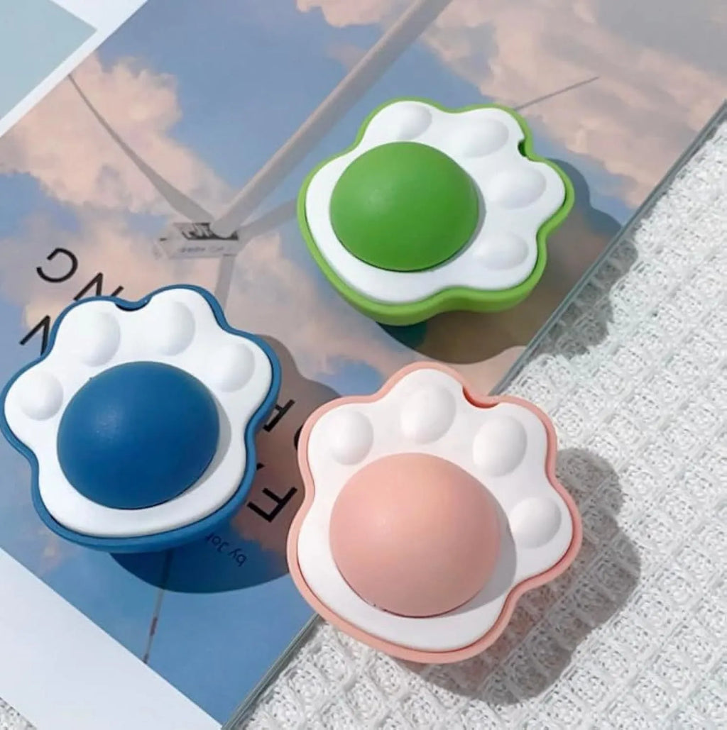 Four coloured catnip balls with edible vine coating for dental health chew toys