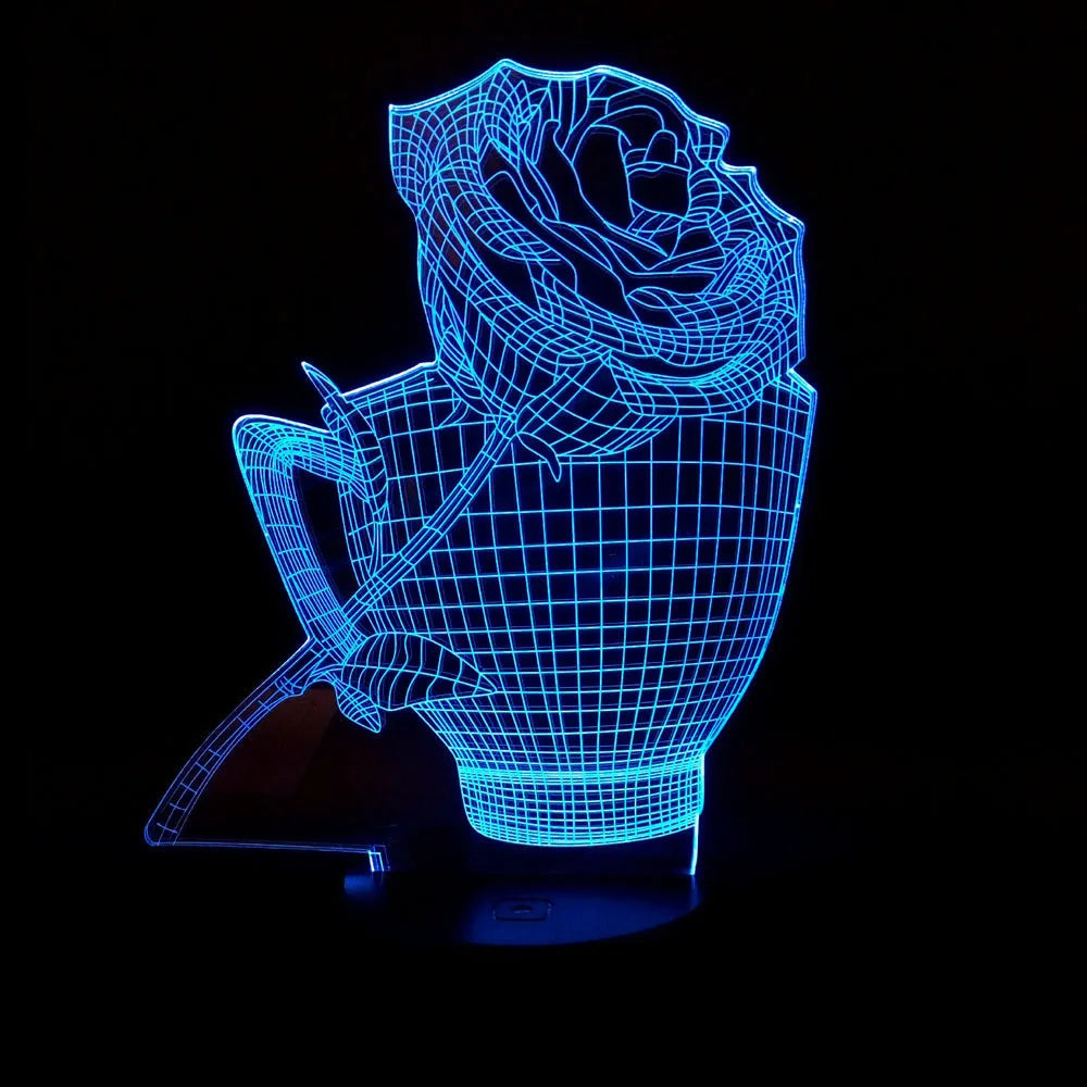 3D rose flower decorative night light with remote control on a bedside table.
