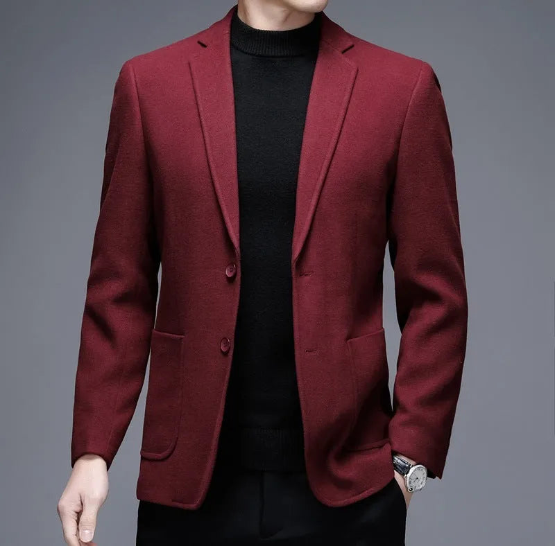 Men's solid colour loose fit winter jacket in grey, shown with long sleeves and round hem.