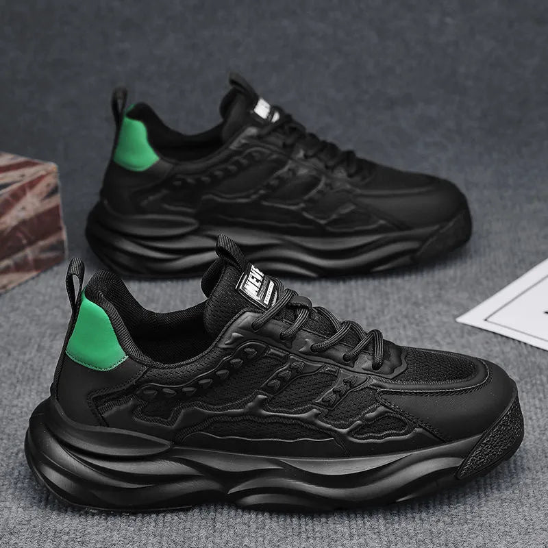 Men's solid colour casual shoes with breathable PU mesh upper and round toe in black and white.