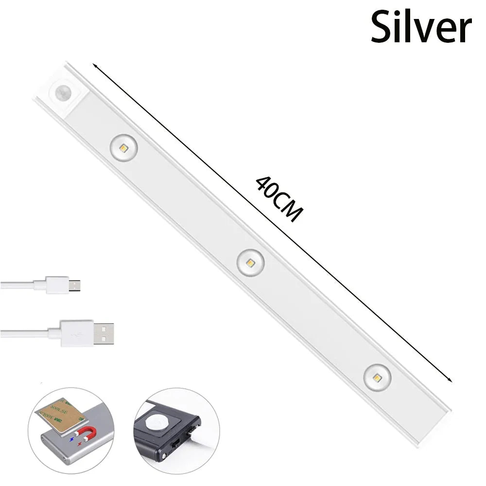 Thin silver aluminium USB rechargeable LED light strip with motion sensor for cabinet mounting