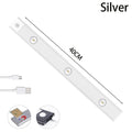 Thin silver aluminium USB rechargeable LED light strip with motion sensor for cabinet mounting