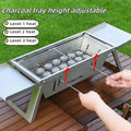 Small foldable portable charcoal grill showing compact folded design for outdoor cooking