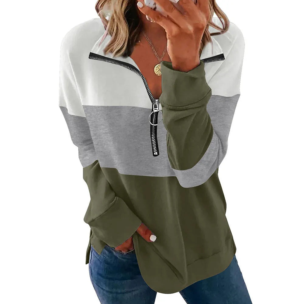 Women's loose long-sleeve leopard print polyester sweater on a hanger