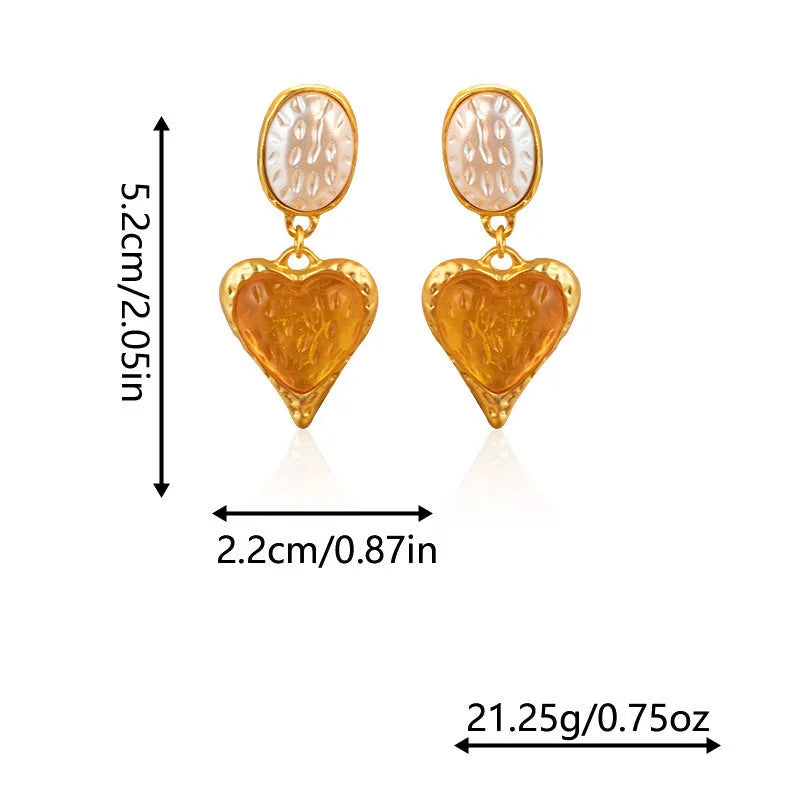 Silver textured oval love heart stud earrings in purple, red, green, and yellow white on a jewellery card.