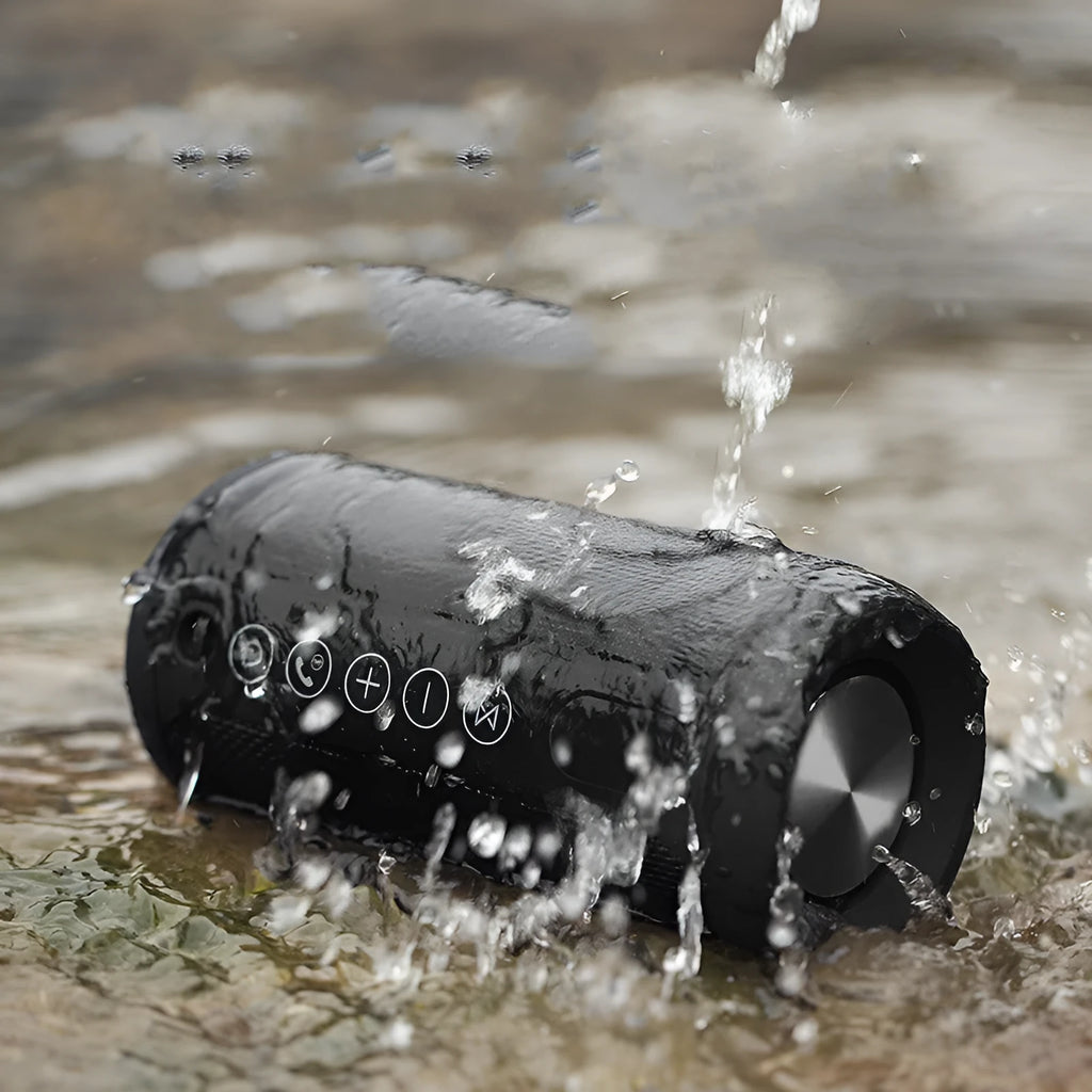 Waterproof portable outdoor speaker in black with Bluetooth, AUX, and TF card playback options