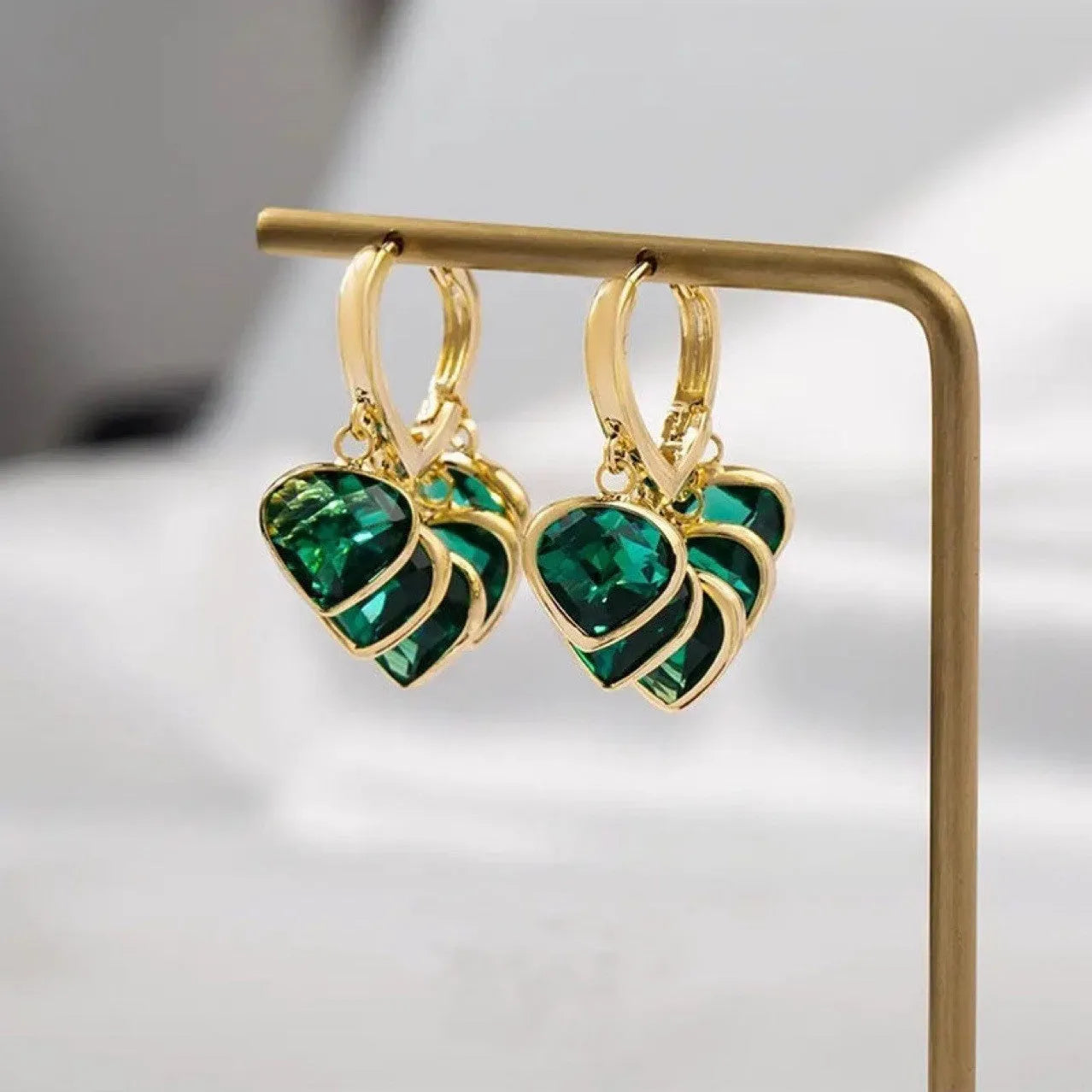 Korean style green heart glass ear clip earrings with dancing pendant design