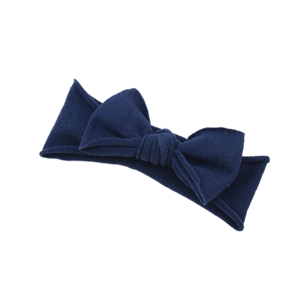 Solid colour knotted cloth headband for baby girls with bowknot design, available in 37 colours