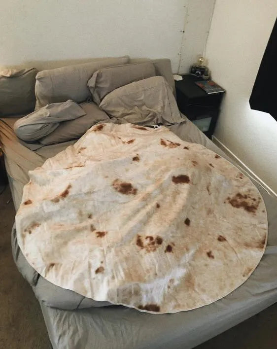 Round and rectangular flannel burrito blankets in various sizes with food-themed print.