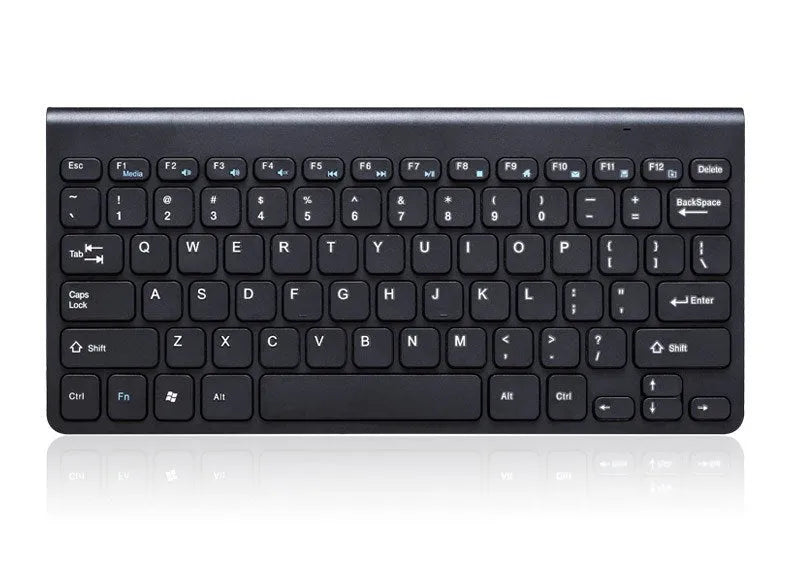 Black and white wireless keyboard and mouse set on wooden desk with 2.4GHz USB receiver
