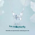 Close-up of a silver butterfly pendant necklace on an adjustable O-ring chain, showing detailed ice rain design.