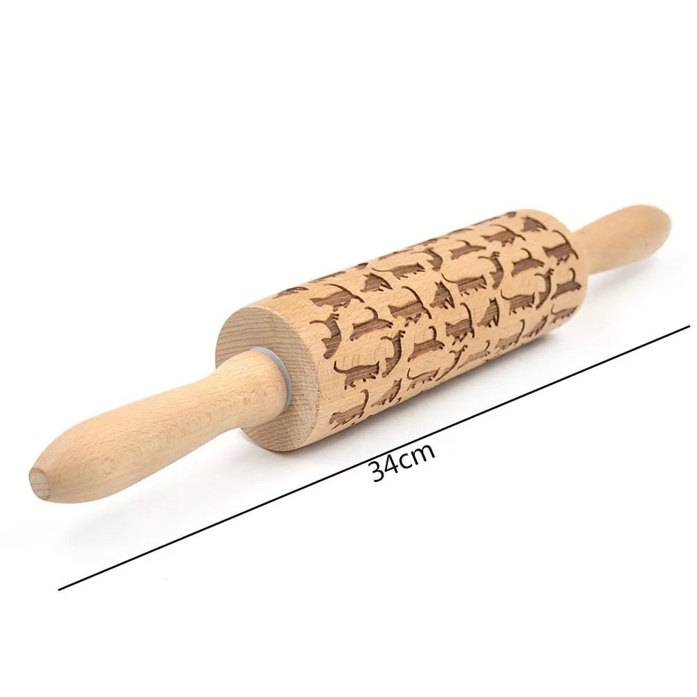 Wooden rolling pin with embossed Christmas pattern, measuring 45cm long.