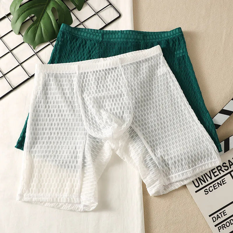 Men's white lace boxer shorts with lengthened hip lifting shaping design on a neutral background