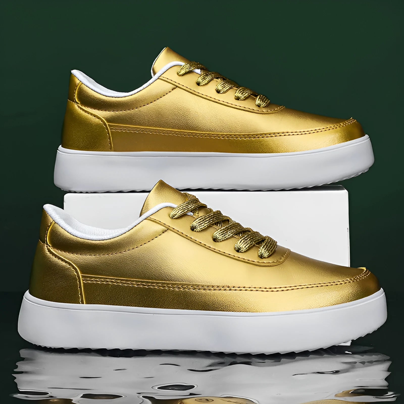 Women's gold leather lace-up casual flat shoes with a flat heel on a white background.