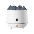 Volcano-shaped white humidifier with USB cable and mist rising from top