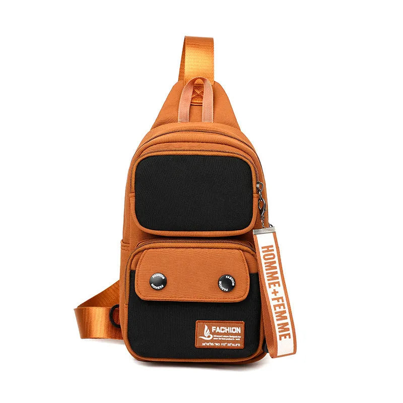 Black nylon crossbody bag with contrast colour accents and a polyester lining.