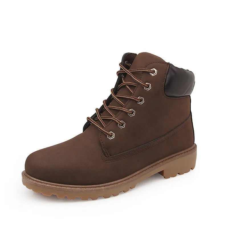 Men's pink high-top Martin boots with velvet lining, round toe, and front lace-up closure on a flat sole.