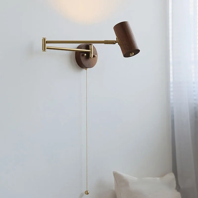Retro rotating wall lamp with long adjustable arm and integrated switch in walnut wood finish