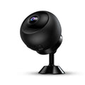 White or black 1080p wireless WIFI security camera with fixed lens on a desk.