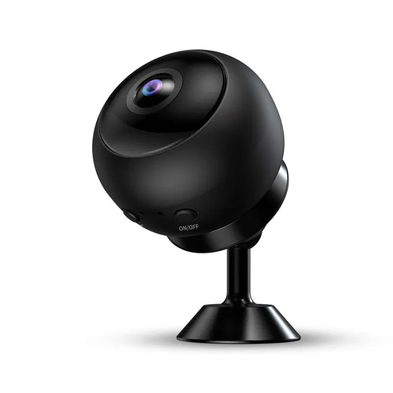 White or black 1080p wireless WIFI security camera with fixed lens on a desk.