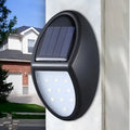 Black LED solar wall light with automatic light sensor measuring 75mm by 120mm