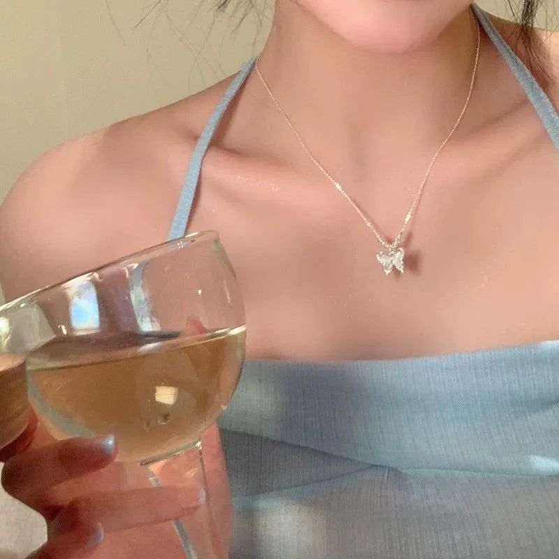 Women's adjustable 925 sterling silver necklace with a square opal butterfly pendant on a cross chain.