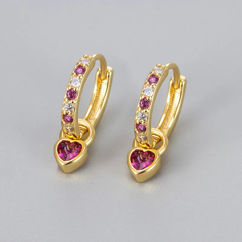 Women's zircon earrings with heart-shaped drops in gold or white gold settings with coloured gemstones