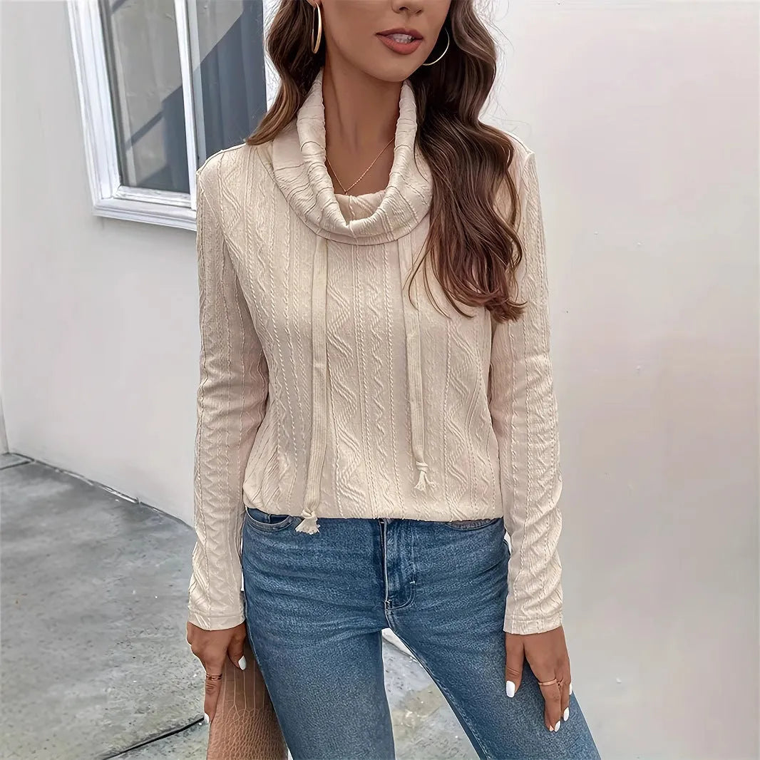 Apricot coloured women's hooded pullover sweater with long sleeves and a front drawstring.