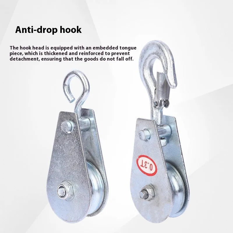 Red industrial steel lifting pulley with a safety latch on the hook.