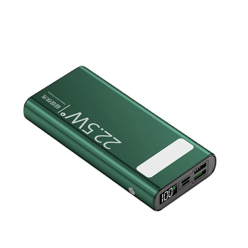 Black alloy power bank with LCD screen showing battery level, alongside green, red, and blue colour options.
