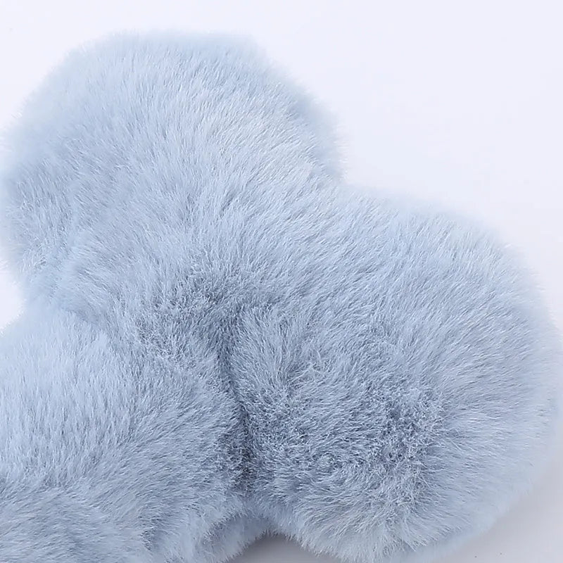 Blue Love Bone plush dog toy with squeaker for interactive chewing play