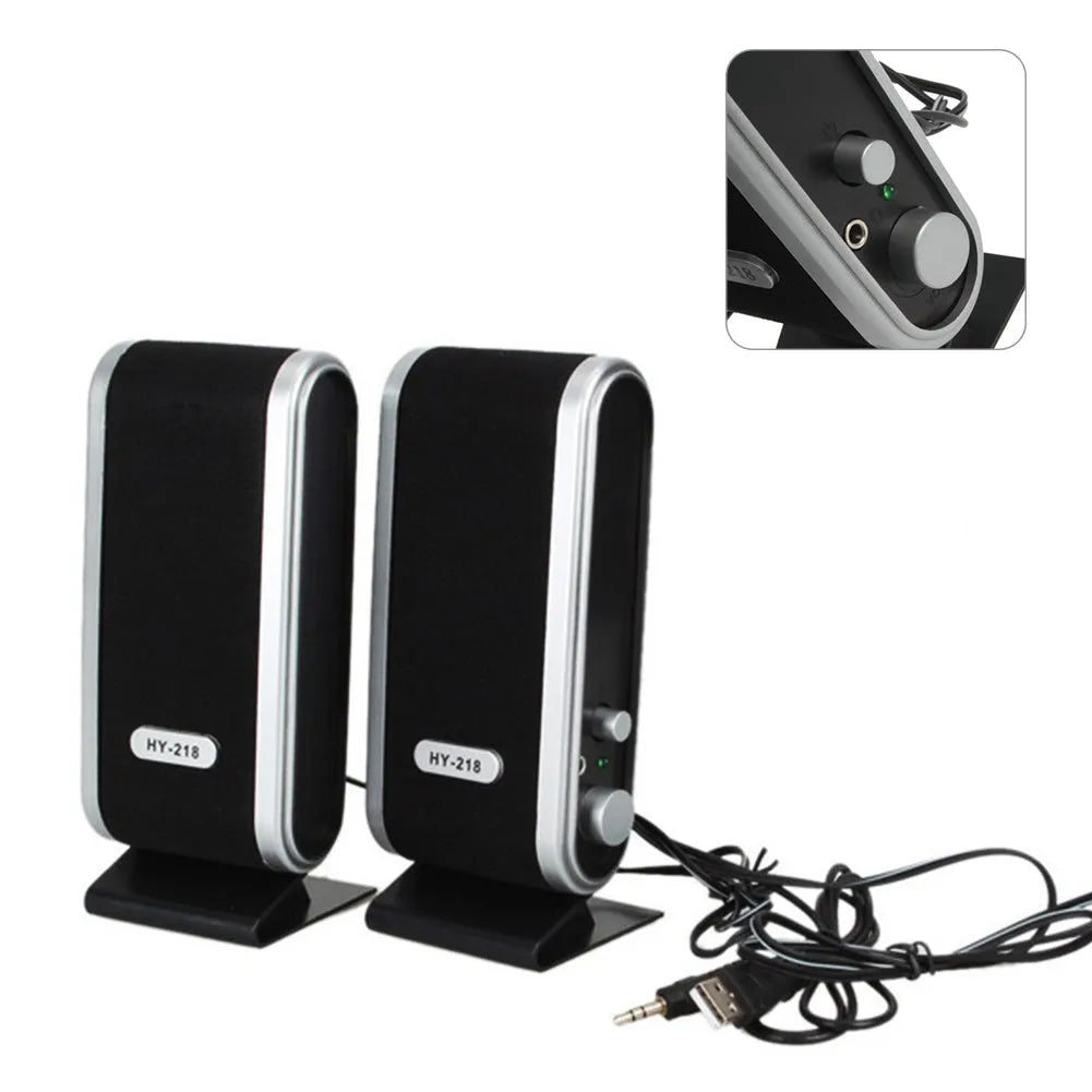 Compact black mini USB stereo speaker for notebook and desktop computers.