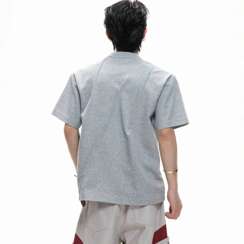Men's grey pleated cotton T-shirt with round neck and asymmetric stitching