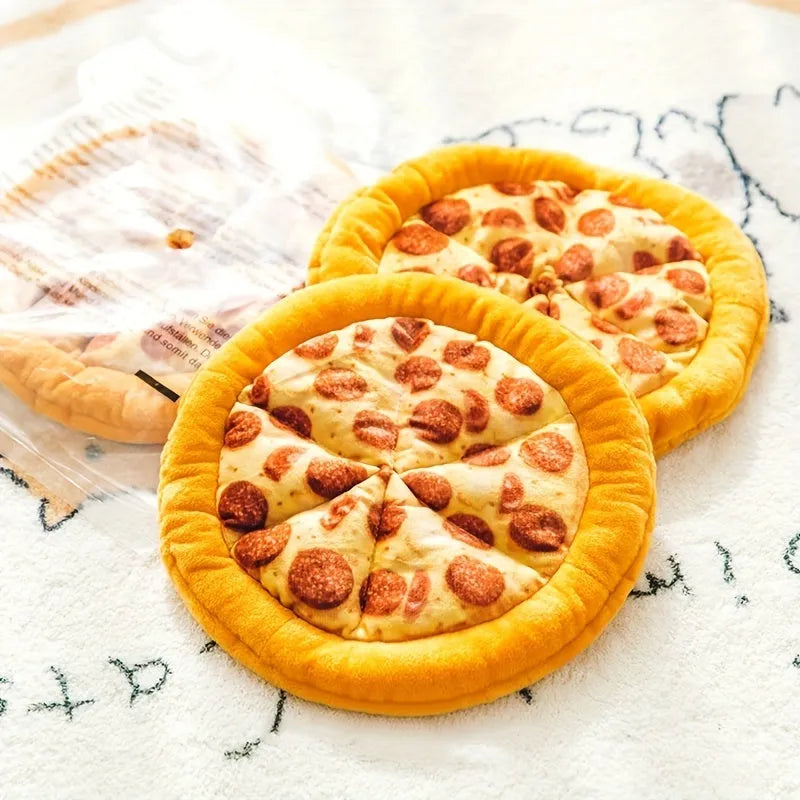 Yellow teddy bear dog chew toy holding a pizza slice with a squeaker inside.