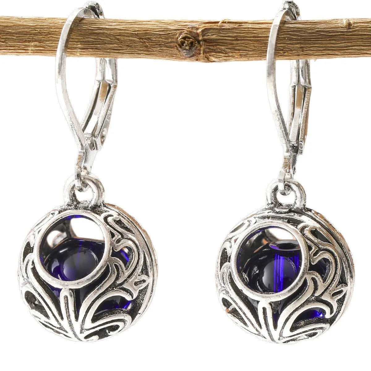 Silver geometric pendant earrings with vintage engraving and blue gemstone accents