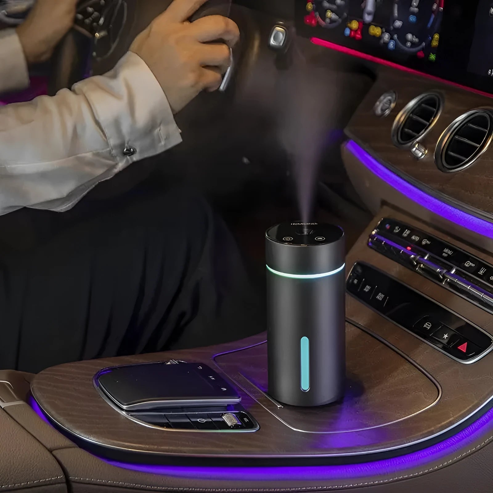 Aluminium portable car humidifier and essential oil diffuser with night light on a black USB cable.