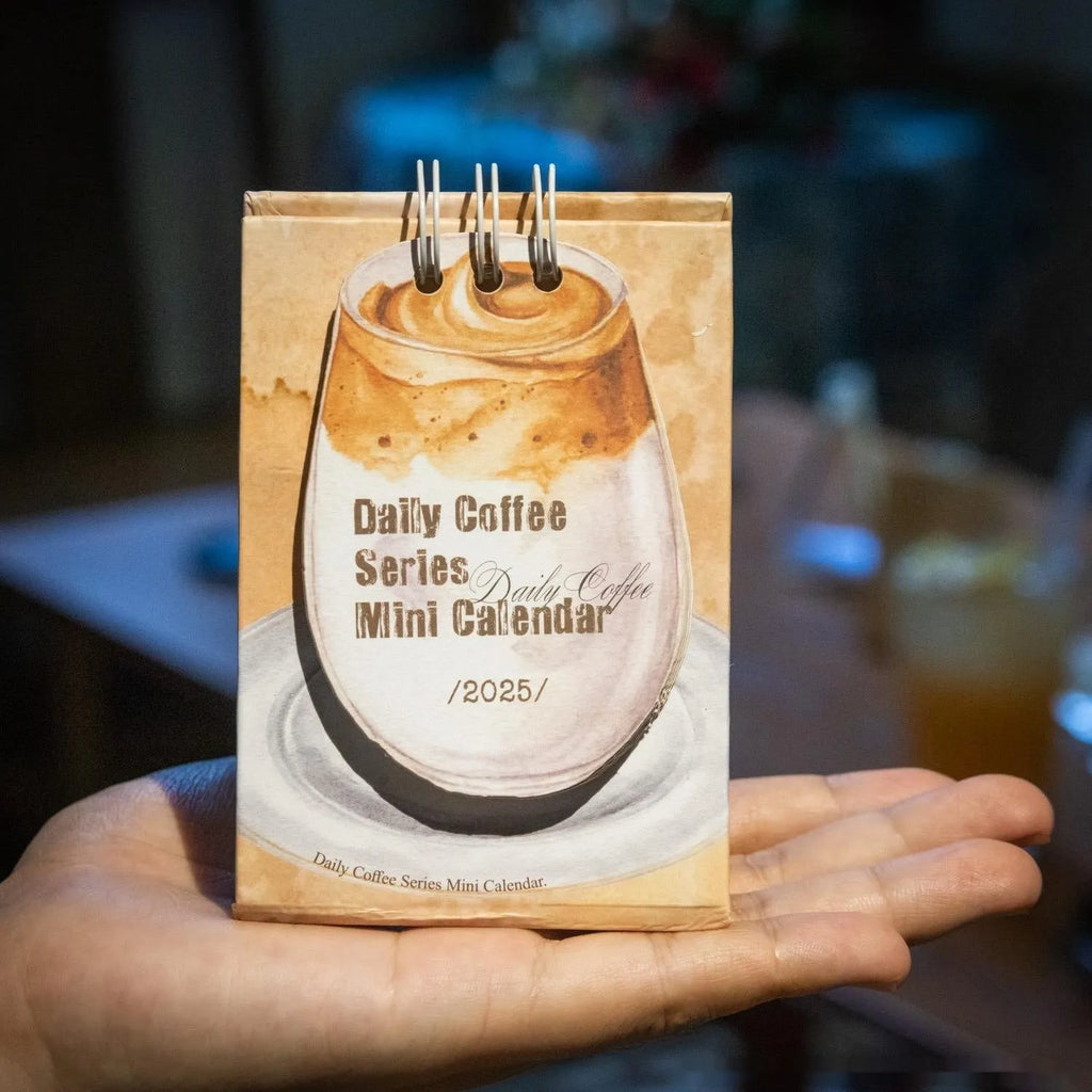 Mini 2025 desk calendar showing four design options including coffee time and motivational phrases