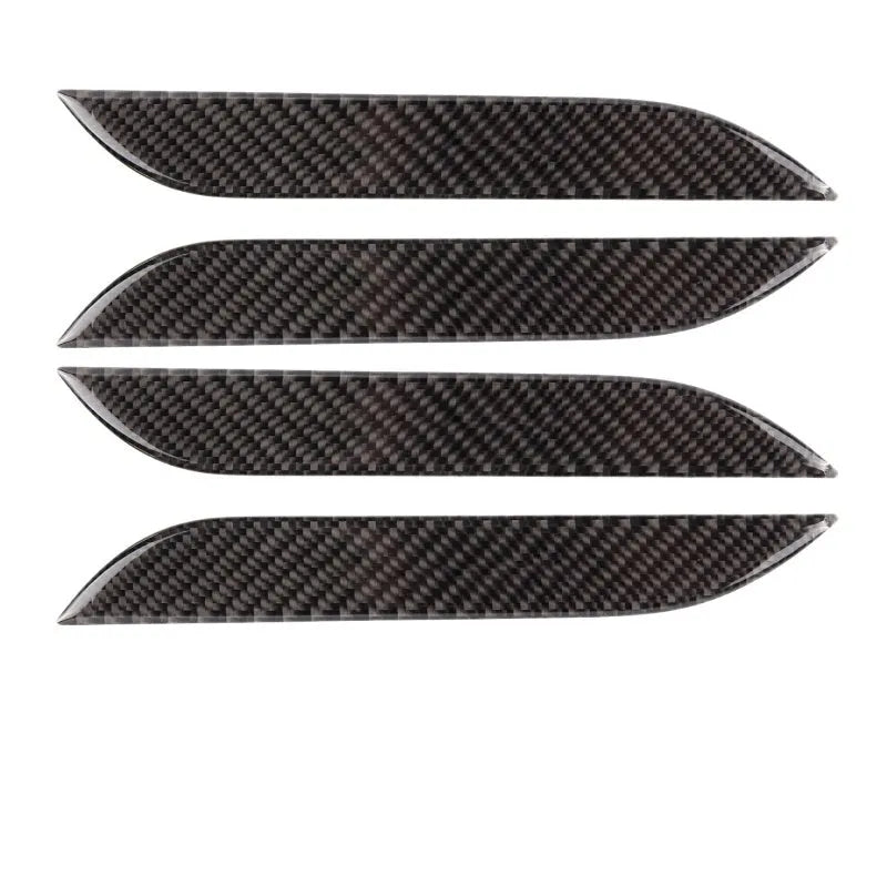 Set of four plain carbon fibre adhesive protection stickers for Tesla Model S door handles.