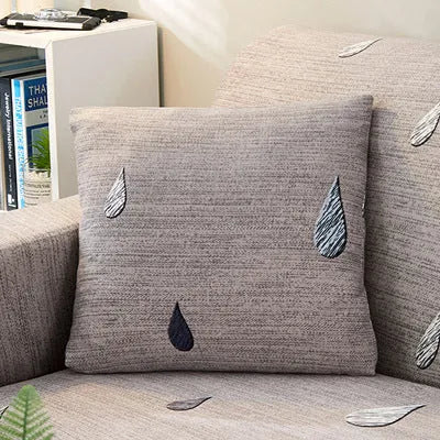 Printed geometric pattern stretch sofa slipcover on three-seater sofa