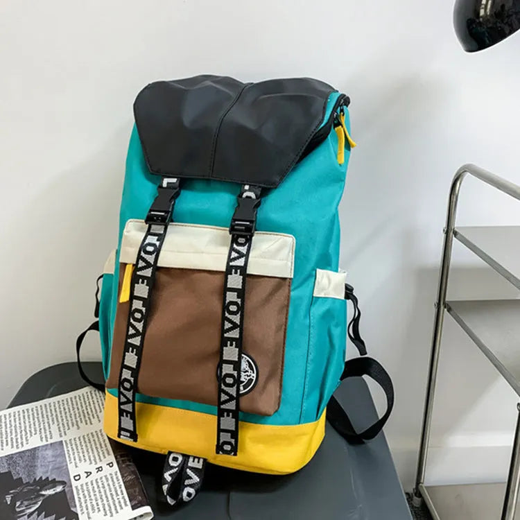 Oxford cloth backpack in black, green, or red, showing handheld and shoulder straps