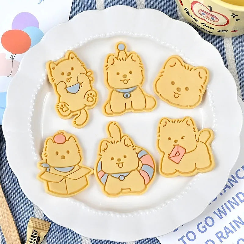 Plastic cartoon biscuit mould for 3D puppy-shaped treats with seven decorative designs