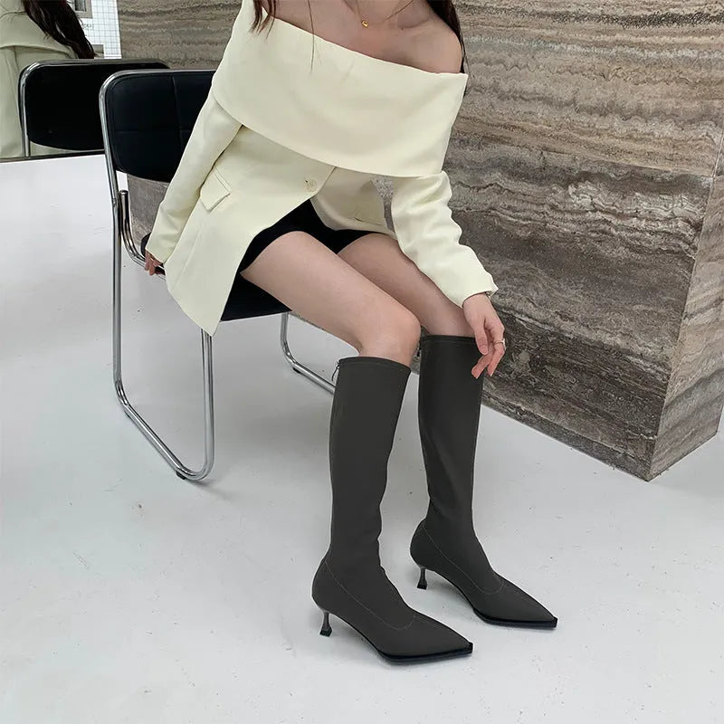 Women's black pointed toe below knee boots with back zipper and stiletto heel
