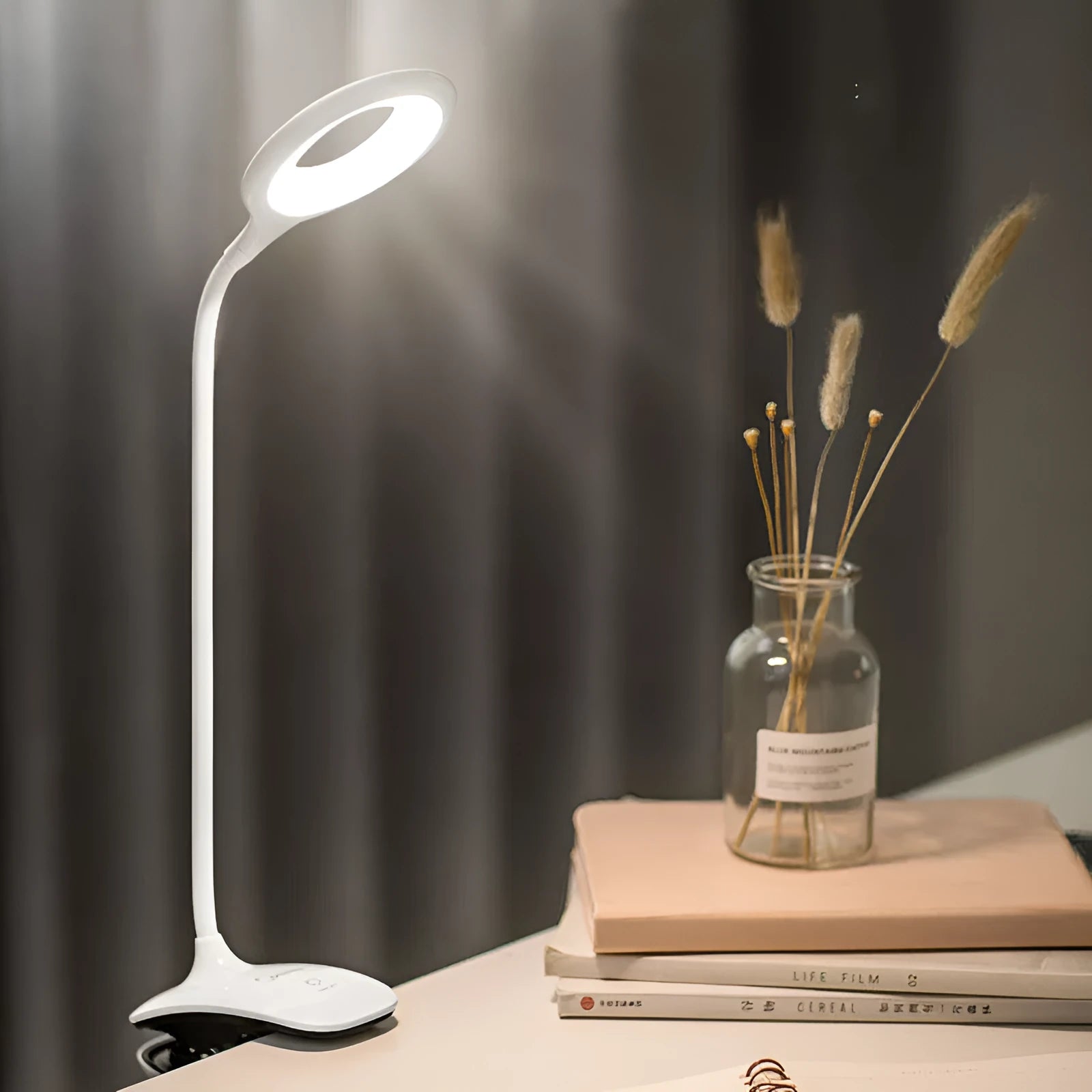 Green, pink and white USB rechargeable touch control table lamps on a wooden surface