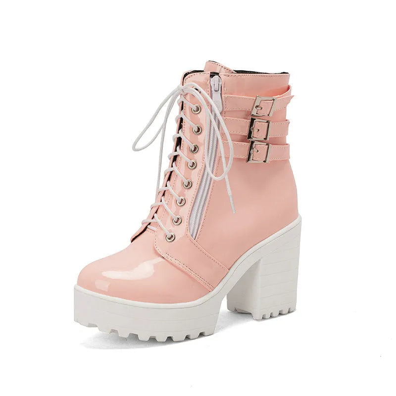 Women's black lace-up platform ankle boots with a round toe and a thick rubber sole.
