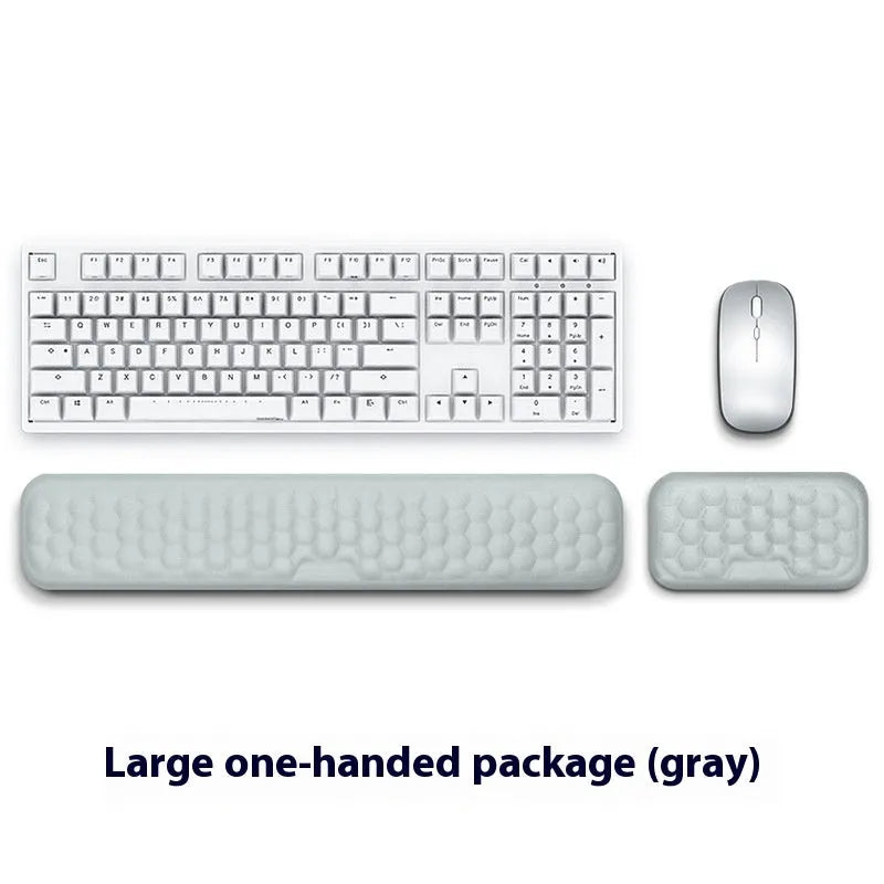 Grey and black memory foam mouse wrist pads with silicone bases, shown in cloth and leather cover options.