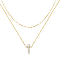 S925 sterling silver double layer cross pendant necklace with twin diamond details on a clavicle chain.